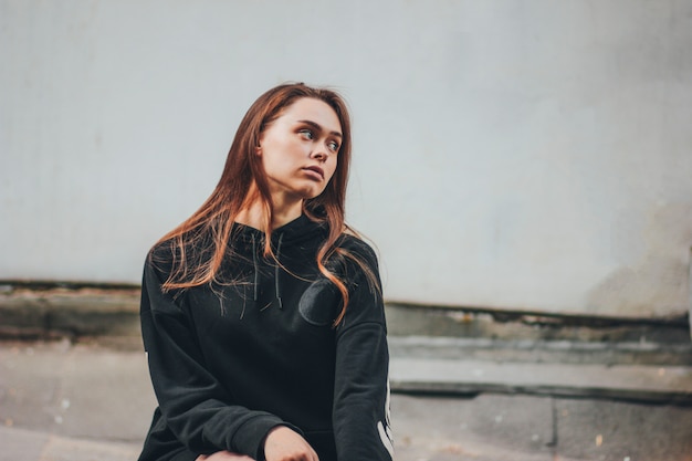 beautiful girl in black hoodie