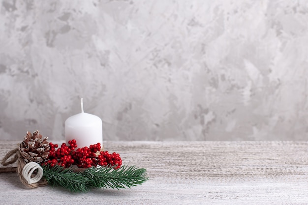 Premium Photo | Candle with decorations on a wooden table