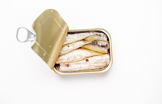 Premium Photo | Canned fish in a jar on a white background