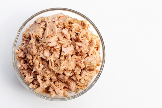 Premium Photo | Canned tuna in glass bowl on white background.