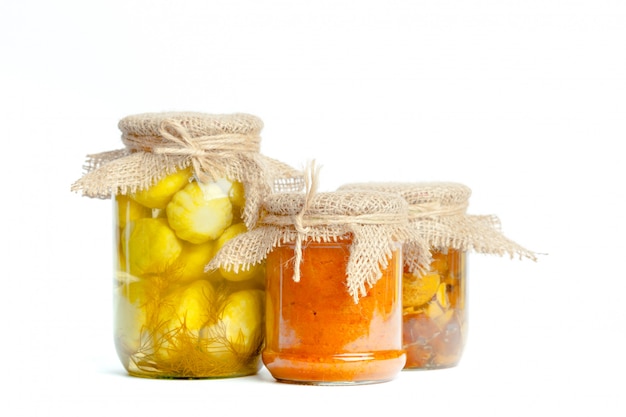 Premium Photo | Canned vegetables in glass jars isolated on white ...