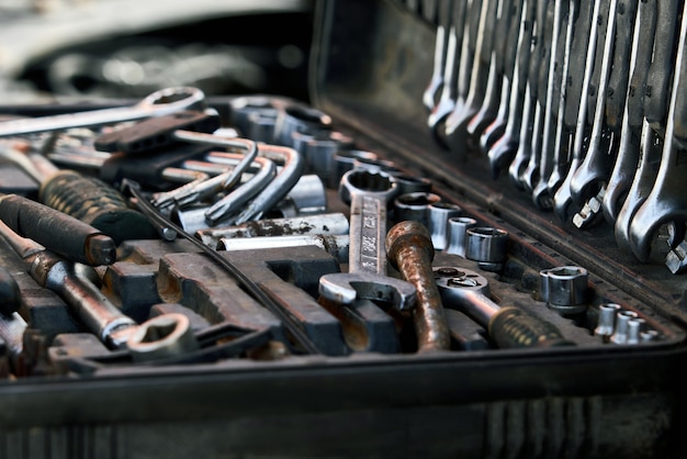 Premium Photo | Car mechanic tool set in auto repair shop