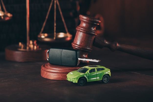 premium-photo-car-toy-and-wooden-gavel-concept-of-selling-a-car-by