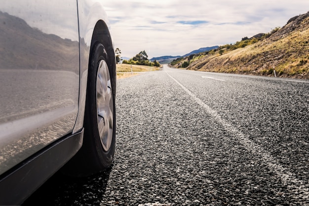 Free Photo | Car travelling by a road