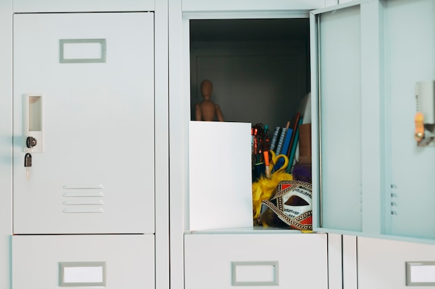 Carnival objects in open locker Free Photo