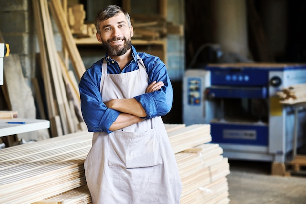 Premium Photo | Carpentry owner in workshop