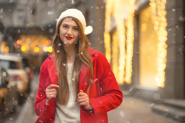 Premium Photo | Casual dressed blond woman in white hat and winter coat ...