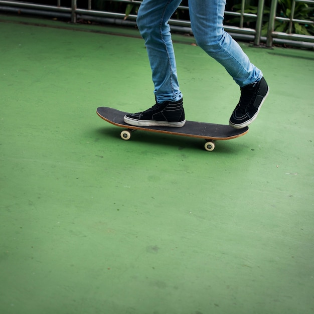 Premium Photo | Casual guy riding skateboard concept