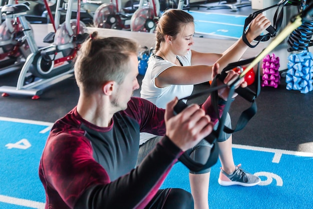 Premium Photo | Caucasian handsome man and young woman join sports club ...