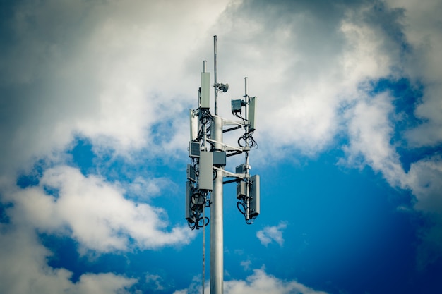 Premium Photo | Cellular base station with transmitter antennas on a ...