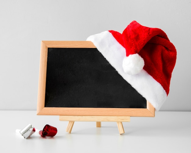 Download Chalkboard mock-up and santa's hat | Free Photo