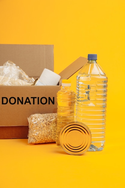 Premium Photo | Charity concept. open donation cardboard box with