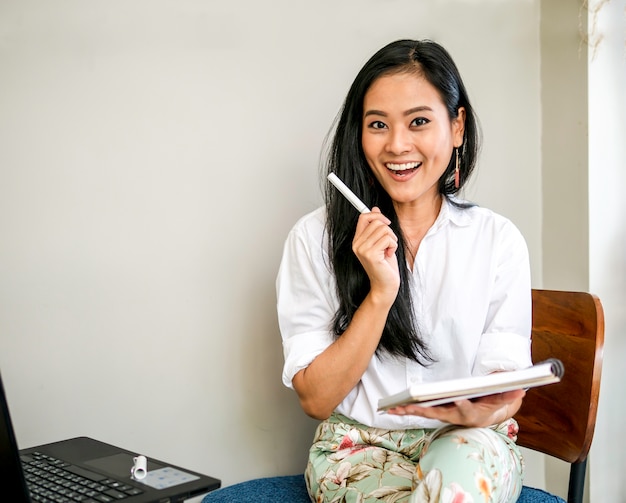 Premium Photo | Charming beautiful freelancer smiling face with ...