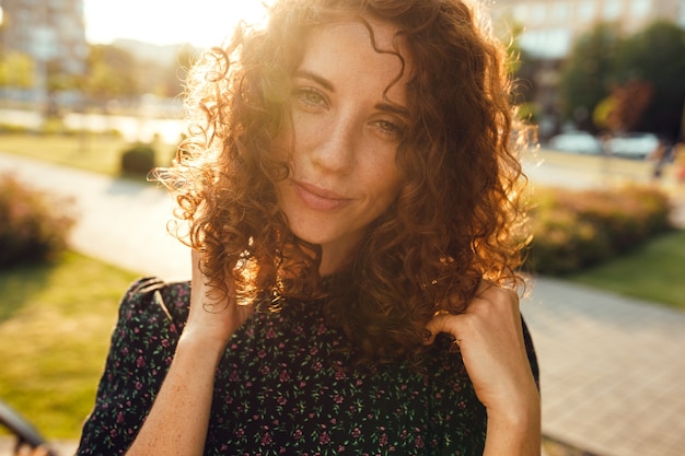 Premium Photo | Charming curly red-haired girl with freckles in dress ...