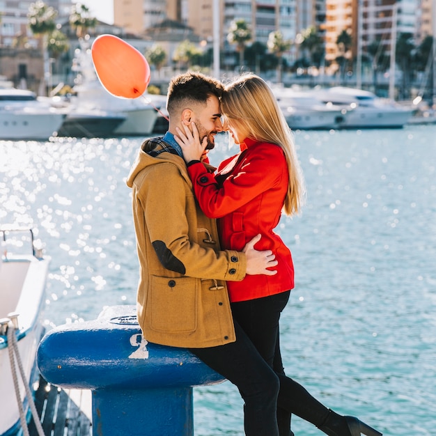 Free Photo | Charming kissing people on seafront