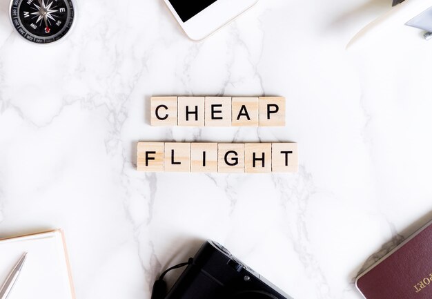 travel agency cheap flights crossword clue