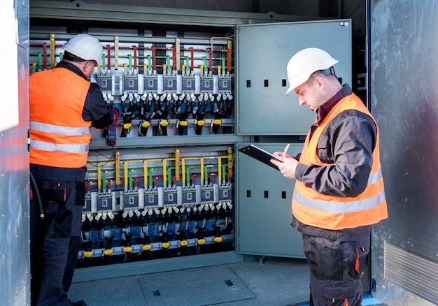 Premium Photo | Checking the operating voltage levels of the solar ...