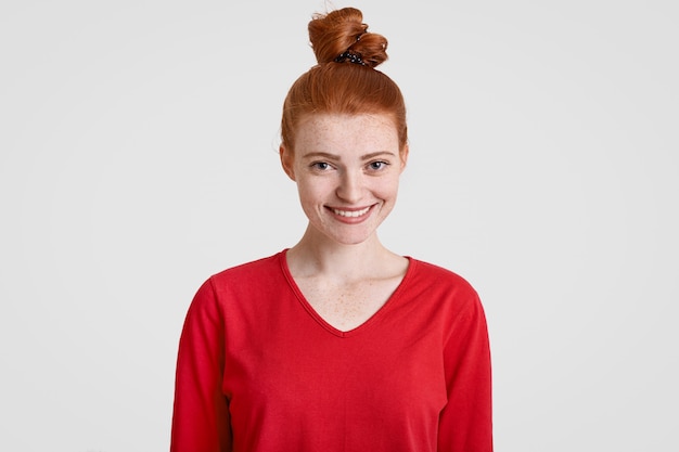 Free Photo | Cheerful attractive teenager with ginger hair knot ...