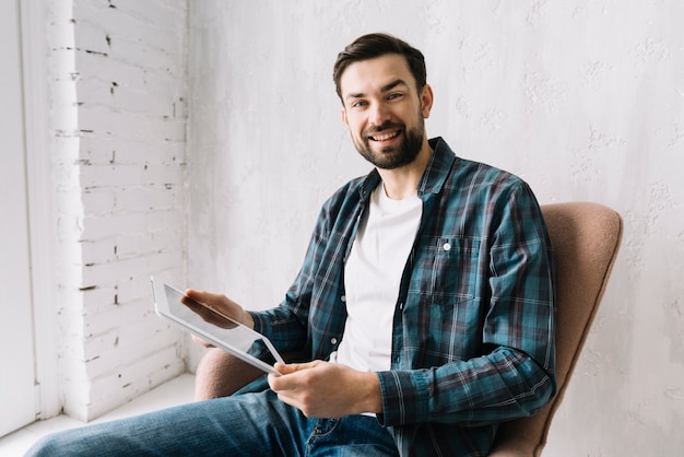 Free Photo | Cheerful man with tablet