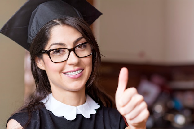 Free Photo | Cheerful student showing thumbs up