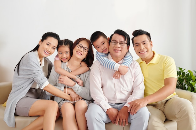 Premium Photo | Cheerful vietnamese children, parents and grandparents ...