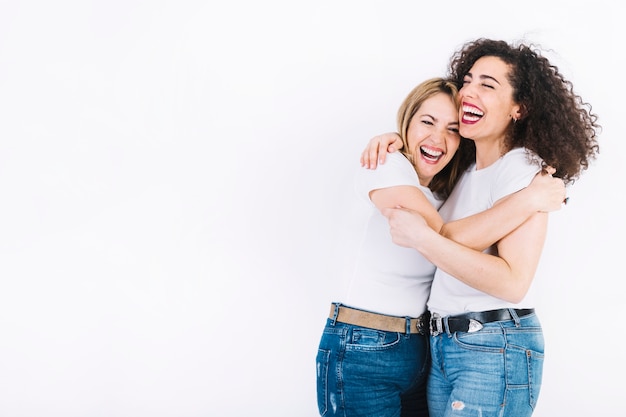 Cheerful Women Embracing Each Other Free Photo 