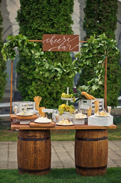 Cheese bar put on two wooden barrels Free Photo