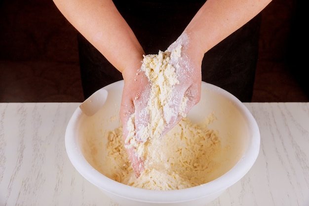 premium-photo-chef-mixing-butter-and-flour-with-hands