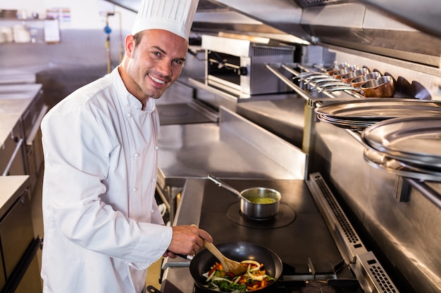 Premium Photo Chef Preparing Food In The Kitchen