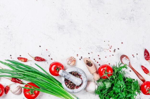 Premium Photo | Cherry tomatoes on a branch, oil, parsley and spice