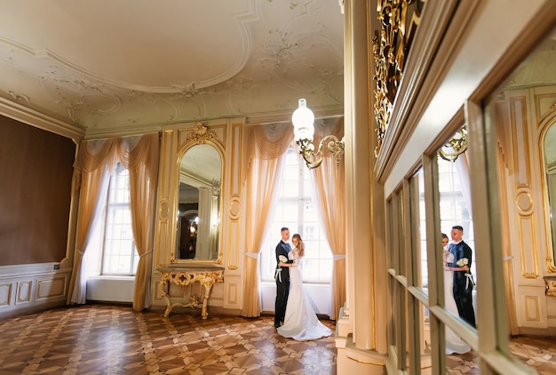 Premium Photo | Chic room interior with mirrors and large windows ...