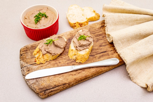 Premium Photo | Chicken liver pate with butter.