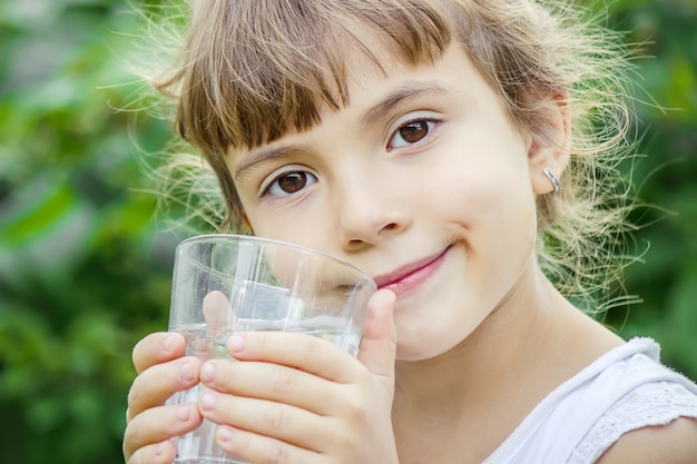 Premium Photo | Child glass of water.