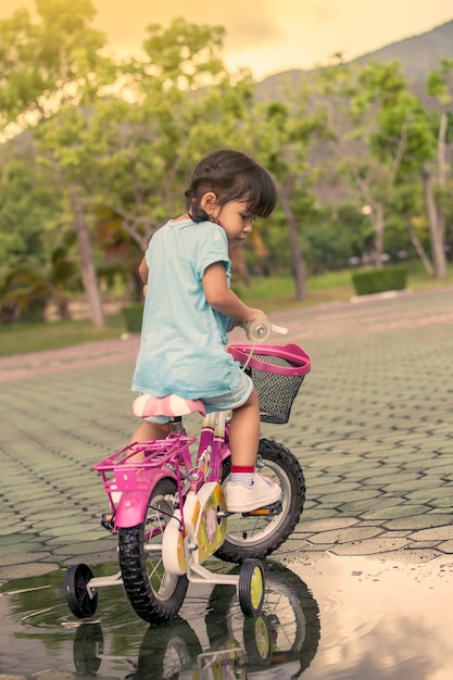 little girl riding bike