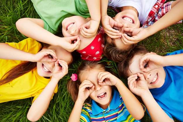 Children playing on grass Free Photo