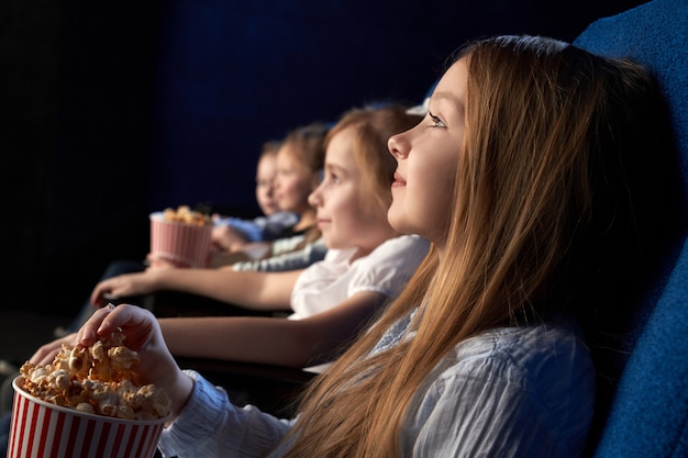 Free Photo Children Watching Movie In Cinema Theatre