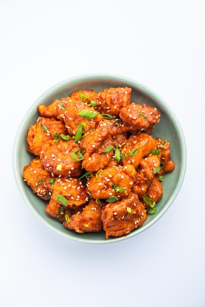 Premium Photo | Chilli chicken dry is a popular indo-chinese dish of ...
