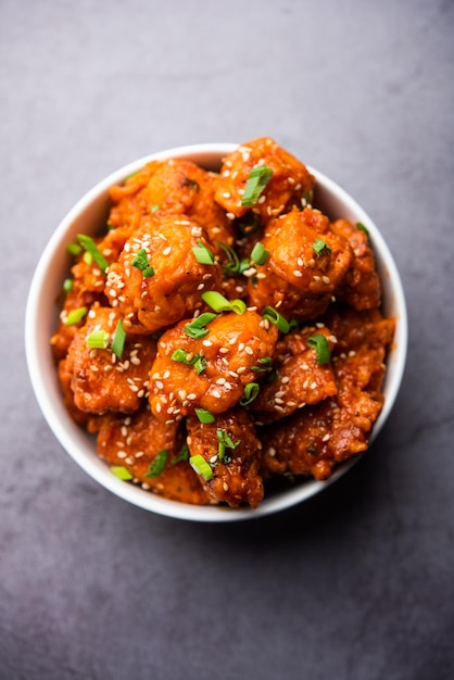 Premium Photo | Chilli chicken dry is a popular indo-chinese dish of ...