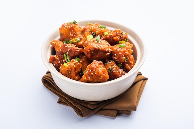 Premium Photo | Chilli chicken dry is a popular indo-chinese dish of ...