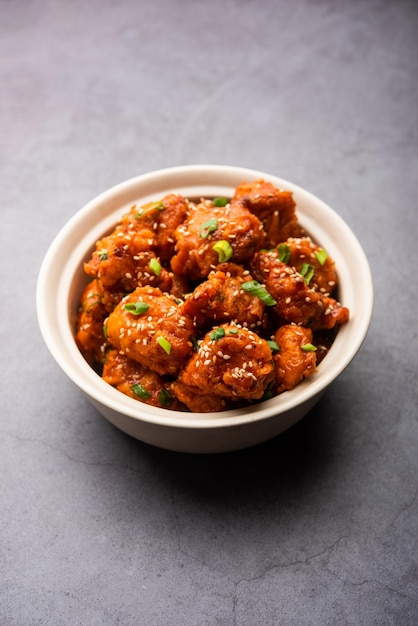 Premium Photo | Chilli chicken dry is a popular indo-chinese dish of ...