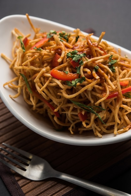 Premium Photo | Chinese bhel is a spicy indo-chinese recipe, served in ...