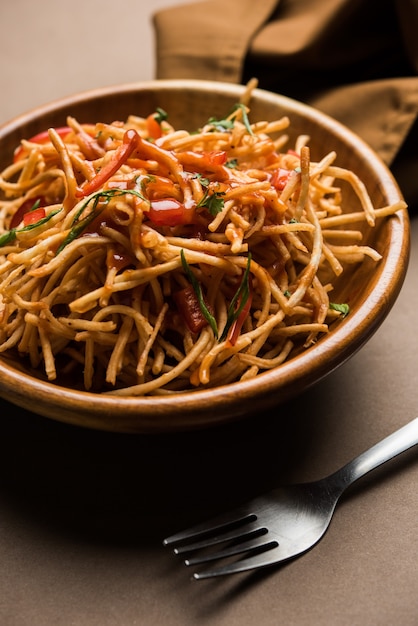 Premium Photo | Chinese bhel is a spicy indo-chinese recipe, served in ...