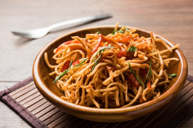 Premium Photo | Chinese bhel is a spicy indo-chinese recipe, served in ...