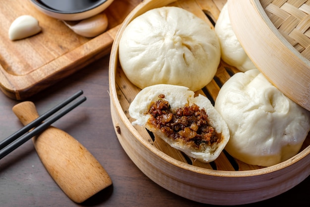 Premium Photo | Chinese breakfast. steamed buns and porridge are on the table