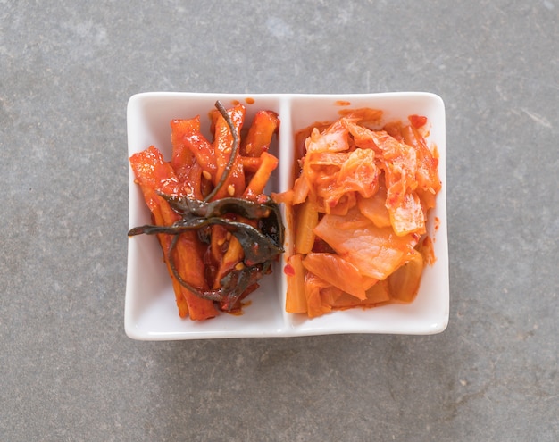 Free Photo | Chinese cabbage, squid and radish kimchi