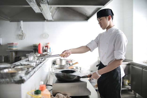 Premium Photo Chinese Chef Cooking In A Restaurant Kitchen