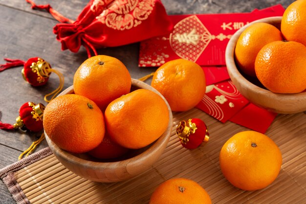 Premium Photo | Chinese new year festival decorations and oranges on