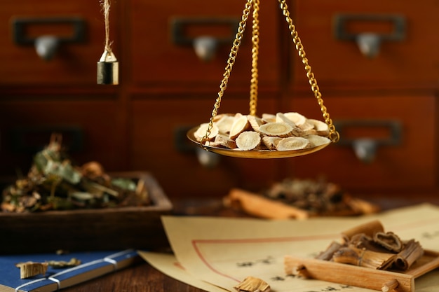 Premium Photo | Chinese traditional herbal medicine in steelyard ...