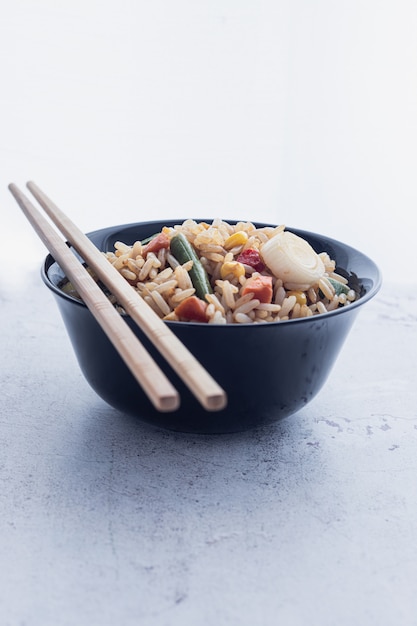 Premium Photo | Chinese vegetable fried rice and eggs served in a bowl ...