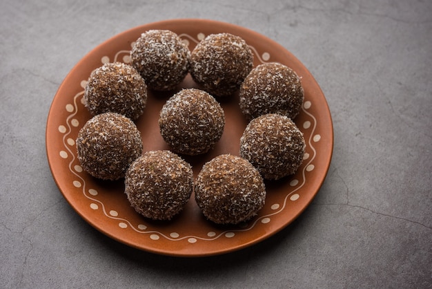 Premium Photo | Chocolate Coconut Laddu Or Laddoo Is A Twist To A ...